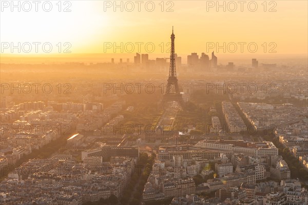 cityscape of paris in the dusk with eiffel tower