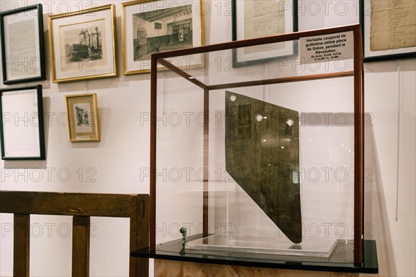 Paris, France - Sept 03, 2019: A guillotine displayed in the Exhibition in the  "Musee de la Prefecture de Paris", (Police Museum) in Paris, France.