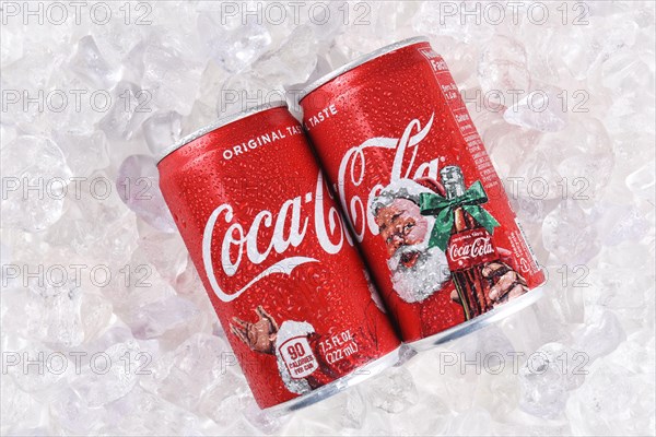 IRVINE, CALIFORNIA - DECEMBER 17, 2017: Two cans of Coca-Cola Christmas cans. The limited edition cans feature Santa Claus for the Holiday Season.