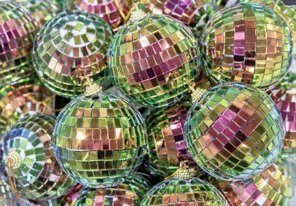 Multicolored mirrored disco balls for the Christmas tree.