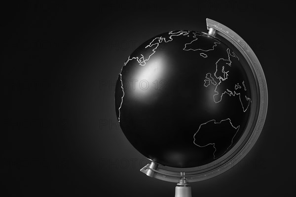 Stylish globe on dark background