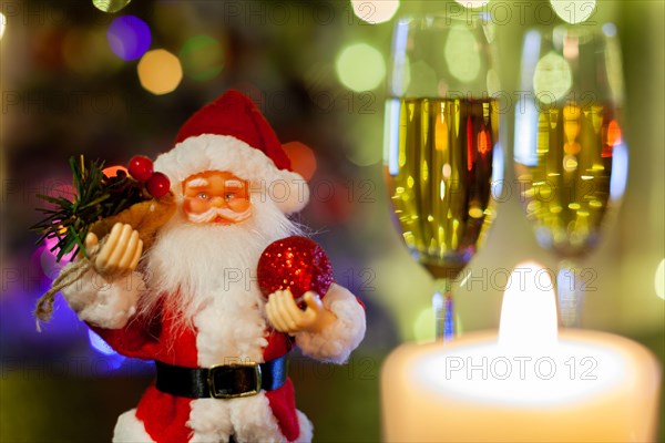 Santa Claus and glasses of champagne, use as greeting card