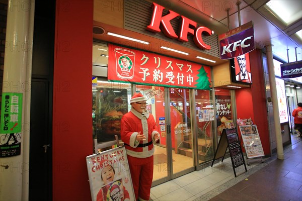 osaka Japan- december 14 2014: kfc restaurant on  Akihabara street.  Akihabara is one of the famous anima area in Tokyo.