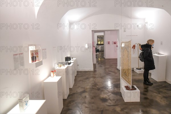 Museum of Broken Relationships: visitors watching the collection. Zagreb, Croatia