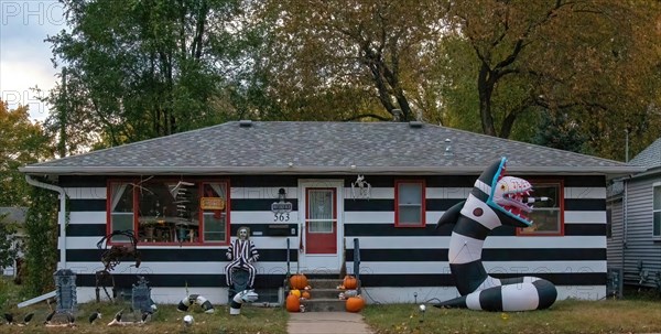 House in residential area decorated as Beetle Juice for Halloween in Winona, Minnesota USA.