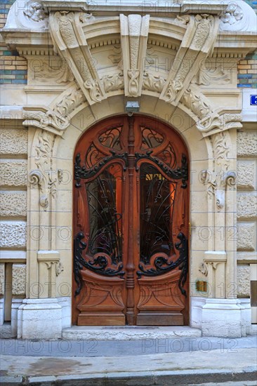 Art Nouveau door at 3 Square Rapp, Paris