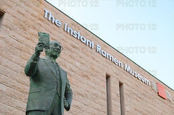 Statue of Cup Noodle creator Momofuku Ando outside the Instant Ramen Museum in Ikeda, Osaka, Japan.