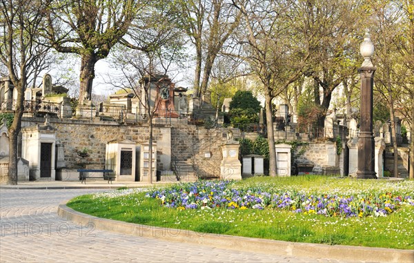 PARIS, FRANCE - MARCH 30, 2011: Montmartre Cemetery (Cimetière de Montmartre) is a famous cemetery in Paris, France.