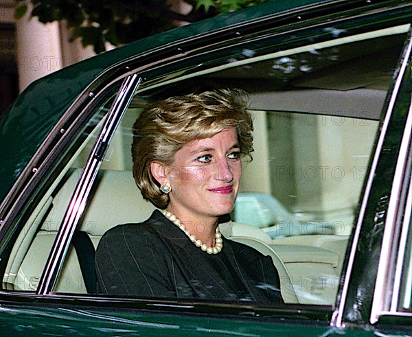 Washington, DC., USA 24th September1996 Diana, Princess of Wales leaves the Brazilian Ambassador's residence en route to  the White House. She was in town for a series of fund raisers to benefit breast cancer research.  At the White House she was hosted by First Lady Hillary Rodham Clinton. Accompanying her in the limousine is the British Ambassador to the United States Sir John Kerr Baron of Kinlochard.
Credit: Mark Reinstein