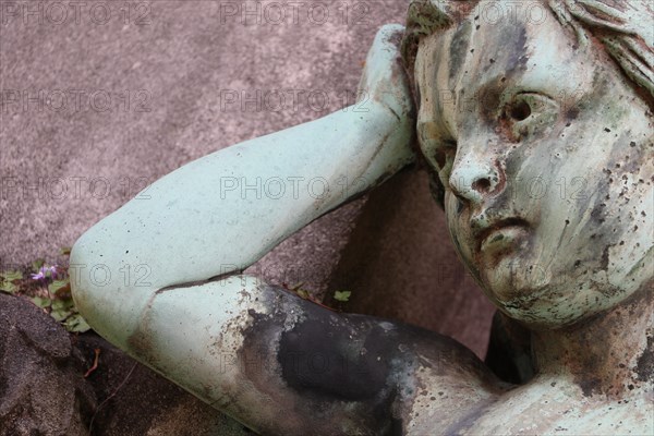 Detail of a grave of the Pere Lachaise Cemetery in Paris