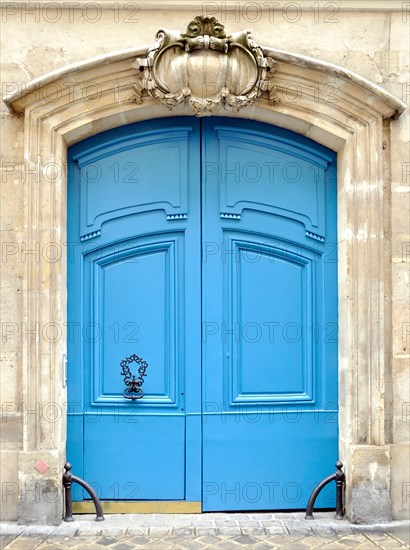 A blue door in Paris, France