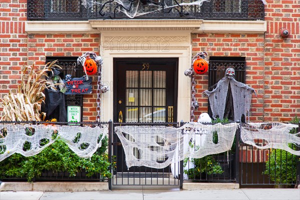 Halloween decorations on a house on E77 Street, Manhattan,  New York City, United States of America.
