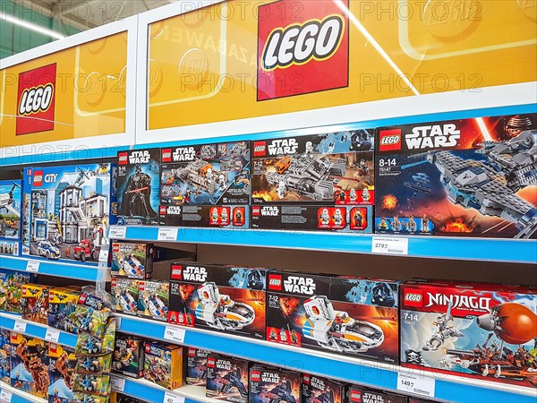 Nowy Sacz, Poland - June 16, 2017:  Lego construction kits for sale in the Tesco supermarket. Lego is a line of plastic construction toys that are man