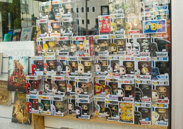 LE MANS, FRANCE - OCTOBER 08, 2017: Row of figures of American company Funko Pop in the shop window