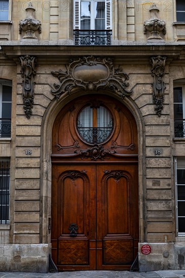 Ornate Paris Door - Thousands of doors and gates adorn buildings in Paris.  Some of the best are on government offices, cathedrals and churches, as we