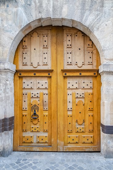 Paris, beautiful wooden door, typical window in the Marais