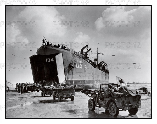 D-Day+6 World War II Operation Overlord American casualties US Navy LST-134 and LST-325 beached at Normandy France, as jeeps driving along the invasion beach carry casualties to the waiting vessels, 12 Jun 1944 WW2 Second World War WWII