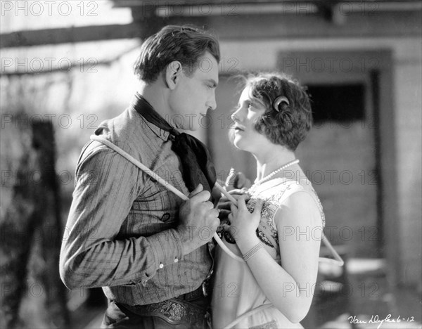 BUCK JONES and young CAROLE LOMBARD in HEARTS AND SPURS 1925 director W.S. VAN DYKE Silent Film Fox Film Corporation