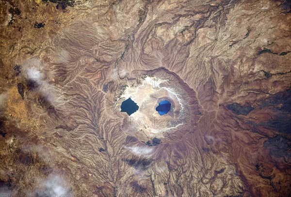 A view of Earth from the International Space Station: Isolated and colourful caldera lakes somewhere between Sudan and Chad, Africa Ê An optimised and digitally enhanced version of a NASA/ ESA image. Mandatory Credit: NASA/ESA/T. Pesquet. NB: Usage restrictions: Not to be presented as an endorsement.