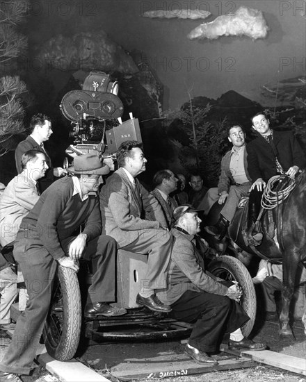 BRIAN DONLEVY and ROBERT CUMMINGS on set candid with Camera / Movie Crew including Cinematographer KARL STRUSS  (centre) during filming of HEAVEN ONLY KNOWS 1947 director ALBERT S. ROGELL Nero Films / United Artists