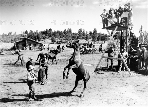 JAMES CAGNEY on set location candid in Colorado with Cinematographer ROBERT SURTEES and Movie / Camera Crew during filming of TRIBUTE TO A BAD MAN 1956 director ROBERT WISE short story Jack Schaefer music Miklos Rozsa cinematography Robert Surtees Metro Goldwyn Mayer