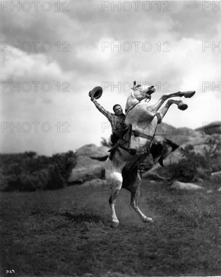 Silent Cowboy Western Movie Star FRED THOMSON circa 1924 with his horse SILVER KING publicity for Harry J. Brown Productions / Film Booking Offices of America (FBO)