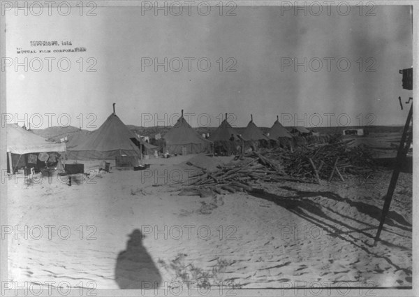 U.S. Army tent camp in Mexico, 1914- row of tents; movie camera at far right