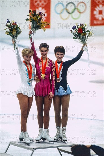L-R Rosalynn Sumners (USA),Katarina Witt (GDR), Kira Ivanova (URS) Figure Skating Ladies' singles medalist at the 1984 Olympic Winter Games.