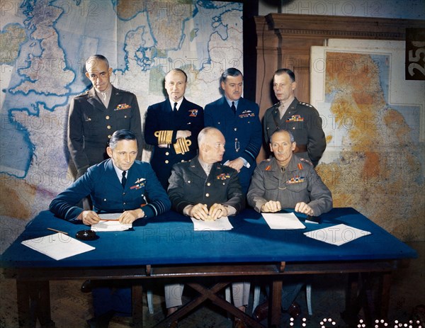 LONDON, ENGLAND, UK - 01 February 1944 - US Army General Dwight D. Eisenhower is shown with his staff.  Left to right, seated: RAF Air Chief Marshall