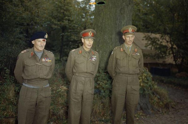 Hm King George Vi With the British Liberation Army in Holland, 13 October 1944 HM King George VI with the Commander of the 21st Army Group, Field Marshal Sir Bernard Montgomery (left) and the Commander of the 2nd Army, Lieutenant General Sir Miles Dempsey, during a visit to General Dempsey's headquarters.