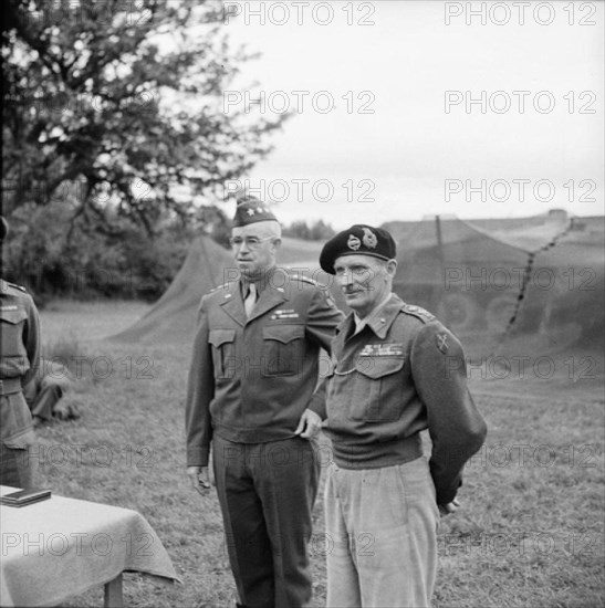 The British Army in Normandy 1944 General Montgomery with General Omar Bradley, commanding US 1st Army, at 21st Army Group HQ, where Bradley was presenting medals to British officers, 13 July.