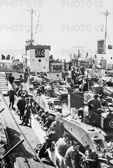 Preparations For Operation Overlord (the Normandy Landings)- D-day 6 June 1944 A British LCT (Landing Craft Tank) loaded with Sherman tanks, at a port on the south coast of England, during an exercise.