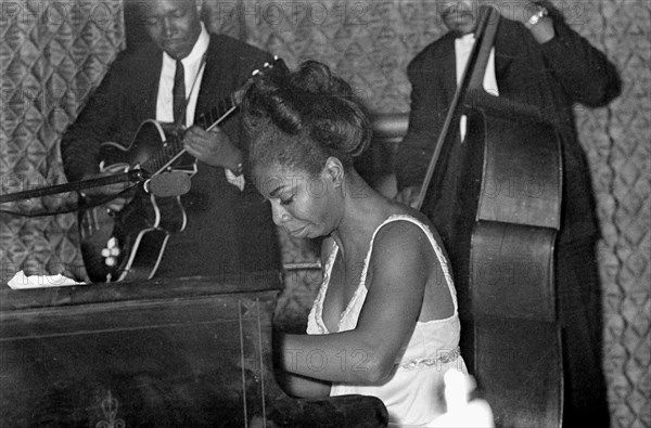Nina Simone June 1965 Jazz singer Pictured preforming at Annies Club on stage playing piano Eunice Kathleen Waymon Nina Simone singer and songwriter