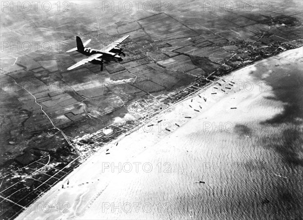 6 JUNE 1944 - American B-26 Marauder  returns to  UK base across the SWORD invasion beach on D-Day with  Lion-sur-Mer top right