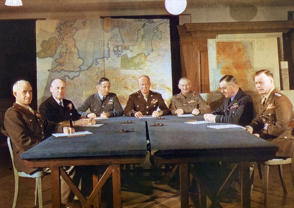 ALLIED COMMANDERS AT SHAEF HQ, London, in May 1944 to finalise details for Operation Overlord - the invasion of France in June. From left: General Omar Bradley, Commander of US land forces, Admiral Bertram Ramsay, Naval Commander; Air Chief Marshall Arthur Tedder, deputy Supreme Commander, General Dwight D Eisenhower, Supreme Commander, Field Marshal Bernard Montgomery, Commander all Land Forces, Air Chief Marshal Leigh-Mallory, Air Forces Commander in Chief, General Bedell Smith, Chief of the General Staff

Edit