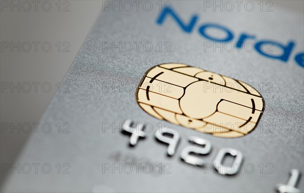 Detail of a icc chip card credit card issued by Nordea bank.