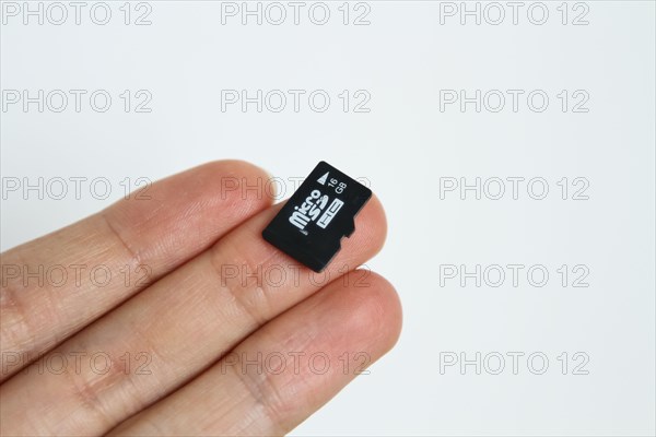 small tiny memory chip card "micro sd"