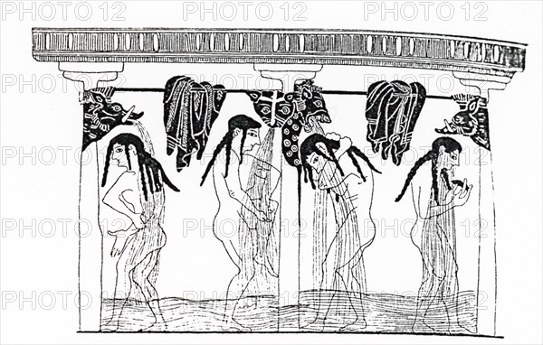 Four Greek women stand in the floor of the bath half up to their knees in water, and take a cold shower from the spouts above.