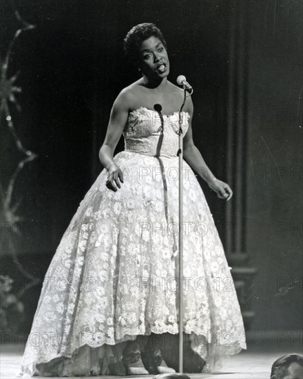 SARAH VAUGHAN (1924-1990) US jazz singer at the London Palladium in April 1958