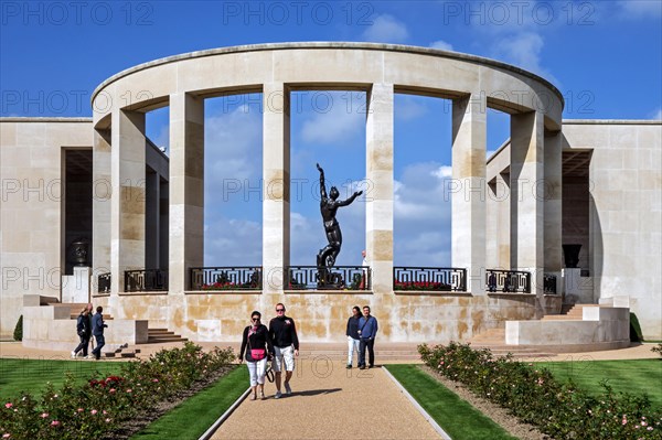 Tourists visiting the Normandy American Cemetery and Memorial, Omaha Beach, Colleville-sur-Mer, Normandy, France