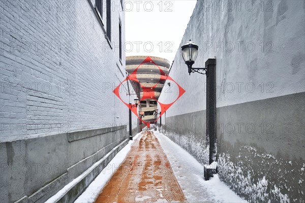 Felice Varini Installation titled "Square with Four Circles" painted on the spiral ramp of a parking garage.