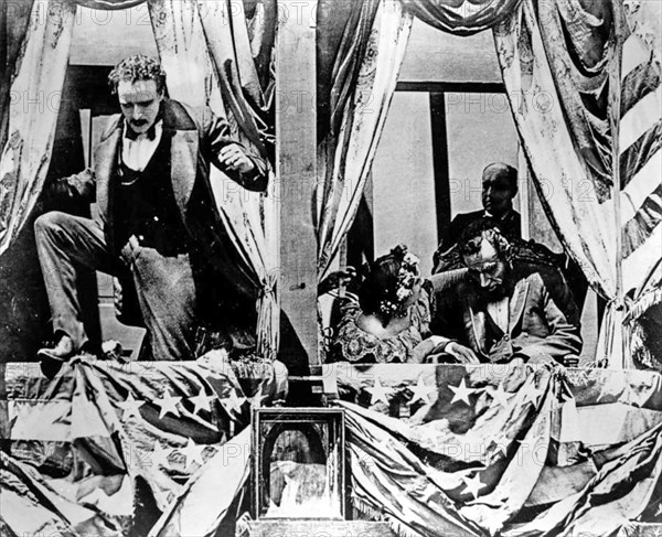 BIRTH OF A NATION 1915 D.W.Griffith silent film with Raoul Walsh as John Wilkes Booth escaping from Ford's Theatre after assassinating Lincoln played by Joseph Henabery