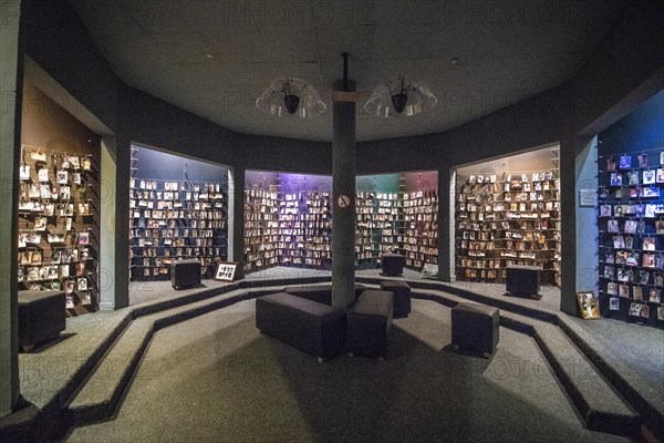 Photographs of known victims of the 1994 Rwandan Genocide line the walls of the Kigali Genocide Memorial, Kigali, Rwanda.