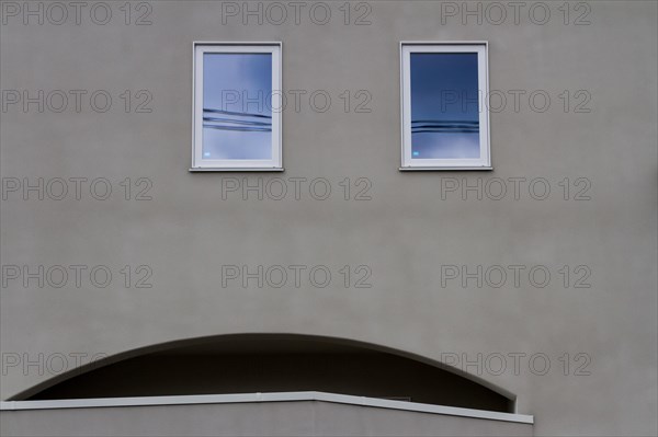 An example of pareidolia sees a worried face in the windows and arch of a house in Yamato, Kanagawa, Japan.