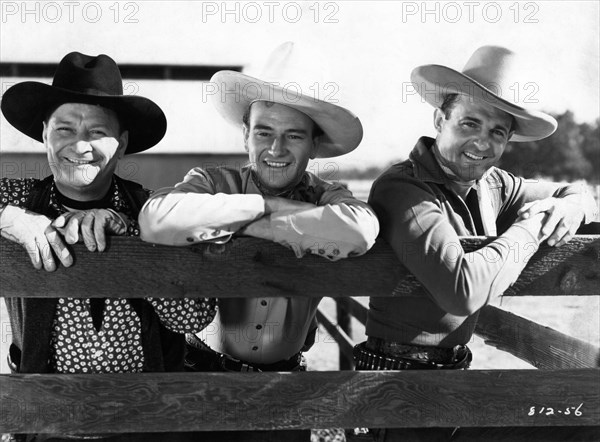 JOHN WAYNE MAX TERHUNE RAY CORRIGAN as The Three Mesquiteers in OVERLAND STAGE RAIDERS 1938 director George Sherman Republic Pictures