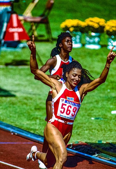 Florence Griffith Joyner (USA)  wins the gold medal in the Women's 100m Final at the 1988 Olympic Summer Games.