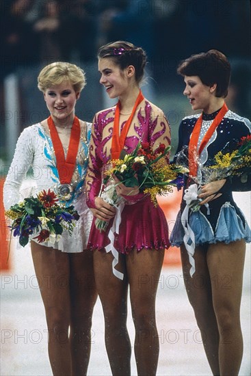 L-R Rosalynn Sumners (USA),Katarina Witt (GDR), Kira Ivanova (URS) Figure Skating Ladies' singles medalist at the 1984 Olympic Winter Games.