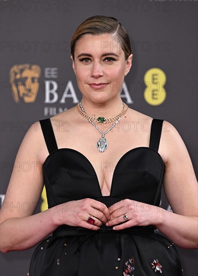 London, UK. February 18th, 2024.Greta Gerwig arriving at the 2024 EE BAFTA Film Awards, Royal Festival Hall. Credit: Doug Peters/EMPICS/Alamy Live News