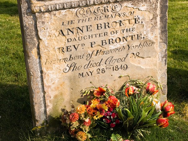 Gravestone marking the burial place of famous author Anne Bronte in St Marys churchyard Scarborough North Yorkshire