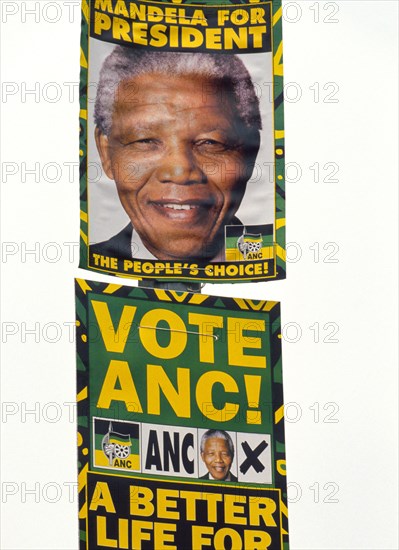 Posters urge voters in South Africa's first multi-racial elections in 1994 to elect black activist Nelson Mandela, who won.